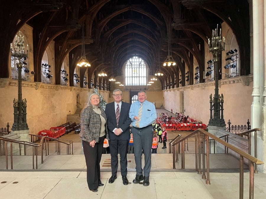 Roz McCall MSP, Stuart McMillan MSP and Jeremy Balfour MSP standing in Westminster Hall, UK Parliament, Friday 6 December 2024.